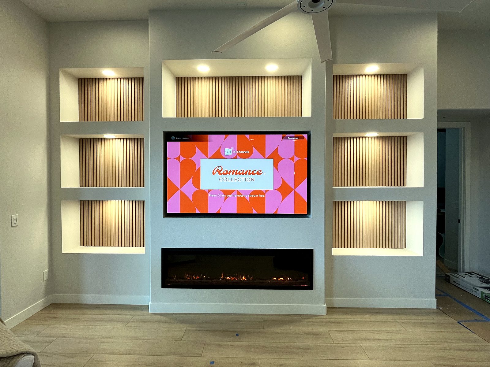 Media wall with lit niches